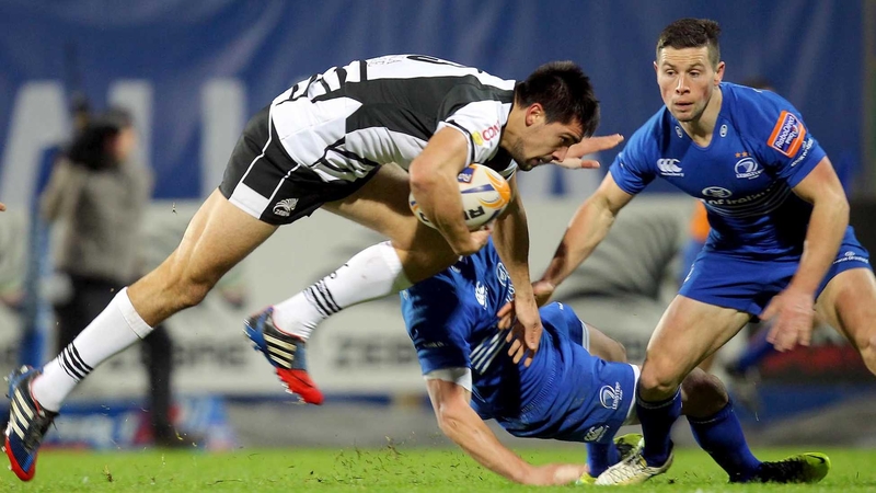 Zebre's Ruggero Trevisan is watched by Noel Reid of Leinster