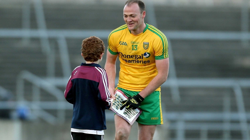 Donegal's Colm McFadden signs an autograph for a Galway fan