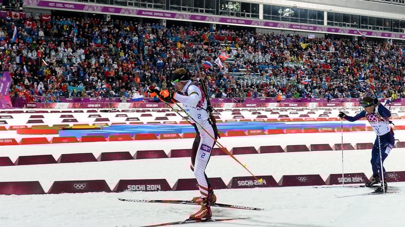 Ole Einar Bjoerndalen (l) finished behind winner Martin Fourcade of France