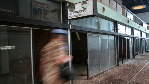 A UN soldier patrols the empty bulding