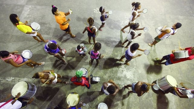 Young performers from the Alegria da Zona Sul samba school practice ahead of Carnival in the Cantagalo shantytown community in Rio, Brazil