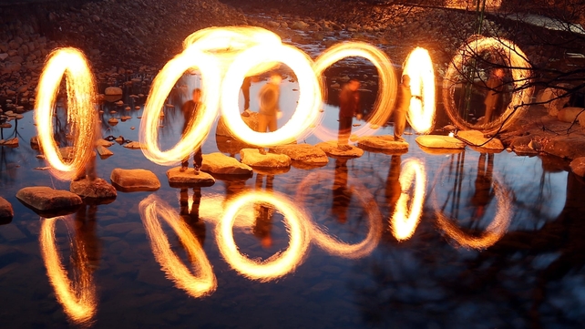 Residents play with fire in Pyongchon Village, Gwangju, southwest South Korea. The tradition is performed in South Korea to ward off misfortunes as part of the first full moon festival of the lunar New Year (Pic: EPA)