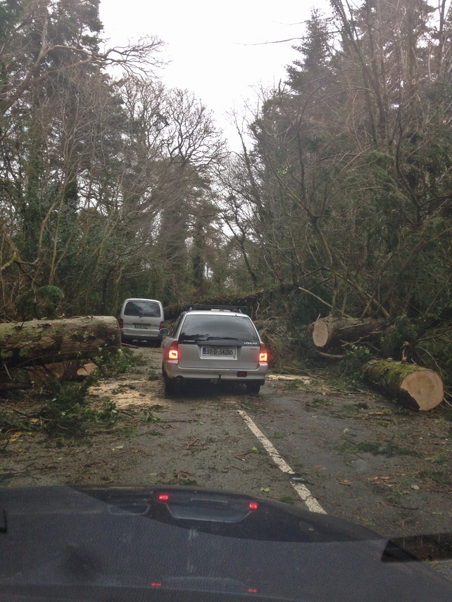 Cars pick their way through storm debris in Kenmare, Co Kerry (Pic: David Mossy)