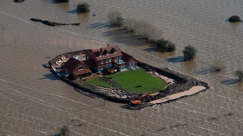 A house near Moorland in Somerset, where owner Sam Notaro has built his own flood defences