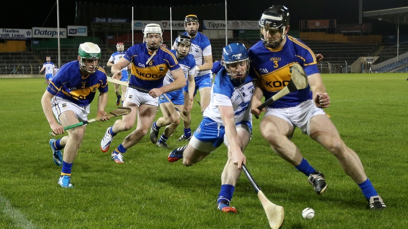Tipperary's Conor O’Mahony and Shane Walsh of Waterford compete for the ball