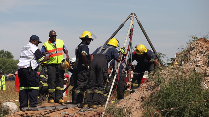 After being medically assessed the miners have been handed over to police (pic credit: EPA)