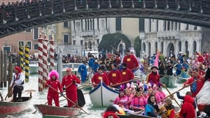 Rowers dressed in costumes take part in the traditional regatta on the Grand Canal which officially opens the Venice Carnival