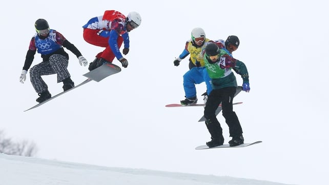 Competitors in the snowbarding racing event at the Winter Olympics in Sochi get some hang time