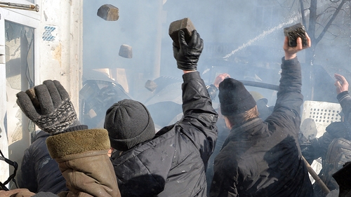 Protesters hurl bricks and stones