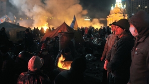Flames engulfed the main anti-government protest camp on Independence Square