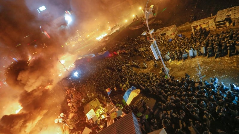 Riot police launch an assault on main protest camp in Kiev (Pic: EPA)