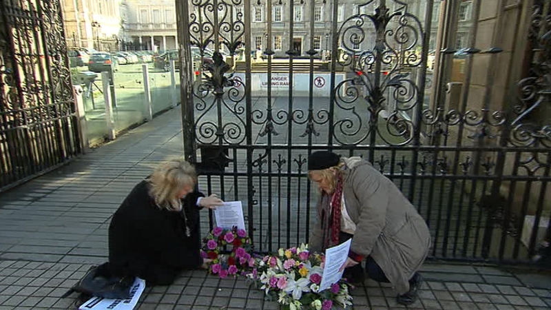 Wreaths were laid at the gates of Leinster House on the anniversary of the Taoiseach's apology