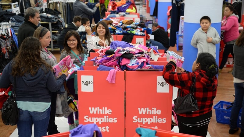 Wal-Mart said its quarterly sales were boosted by hurricane-related purchases and soaring online sales