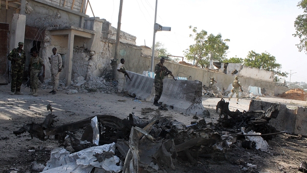 Somali soldiers stand guard around the presidential palace in Mogadishu