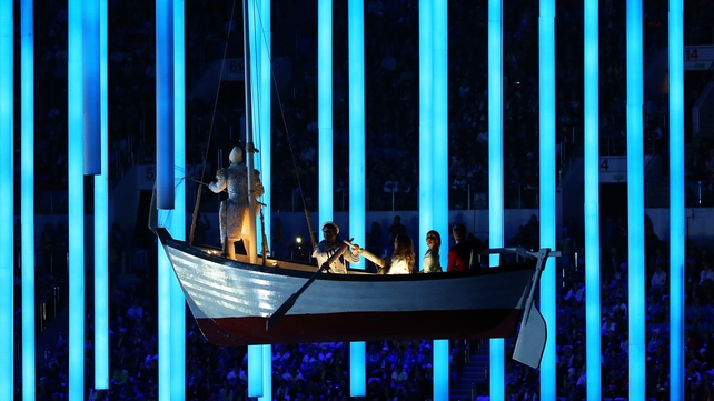 A boat floats serenely across the stadium during the closing ceremony