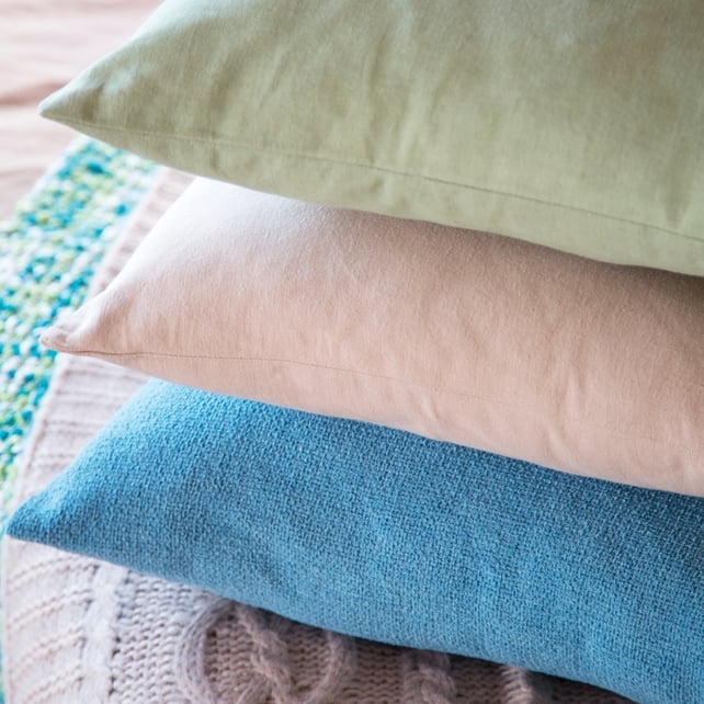 Chenille cushion duck egg €8, 2pk plain dye cushion cover green €4.90, 2pk plain dye cushion €4.90