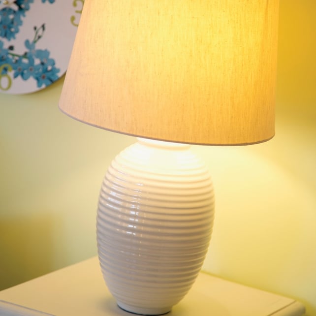 Ribbed ceramic lamp €25, printed wall clock €6