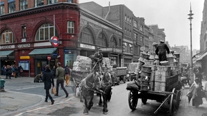 A street scene in London’s Covent Garden with the underground station and a horse and cart in the background (Pic: Museum of London)
