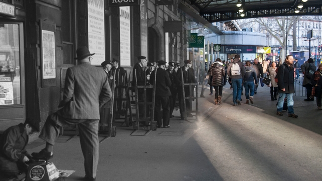 1950 - Boy shining shoes outside the Tea Room at Victoria station. A group of porters can be seen with their trolleys waiting to help travellers with their luggage (Pic: Henry Grant Collection/Museum of London)