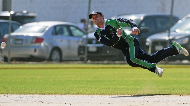 Ireland's William Porterfield dives for a ball against the West Indies