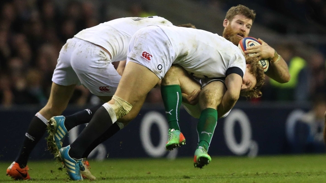 Ireland’s Gordon D’Arcy is tackled by England’s Billy Twelvetrees