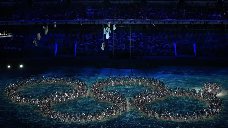 Dancers re-enact the Opening Ceremony ring failure during the 2014 Sochi Winter Olympics Closing Ceremony