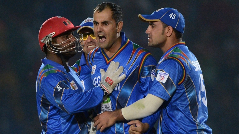 Mohammad Nabi celebrates taking a wicket