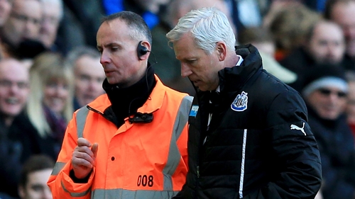 Alan Pardew heads for the stands after his sending off