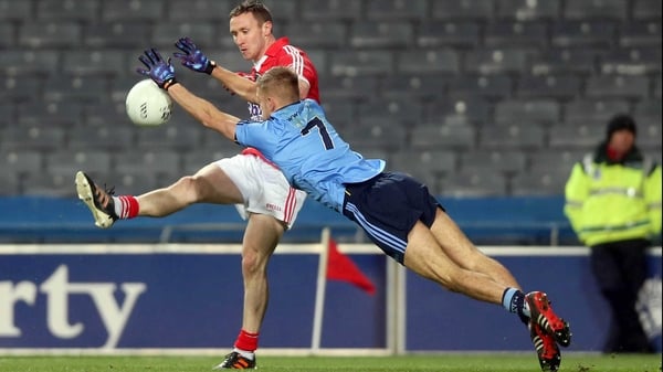 Dublin's Johnny Cooper and John Hayes of Cork in action at Croke Park again