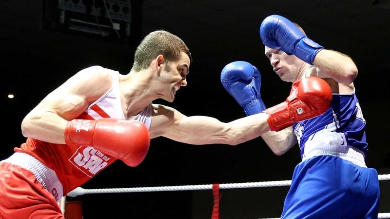 Adam Nolan lands a blow on Fergal Redmond