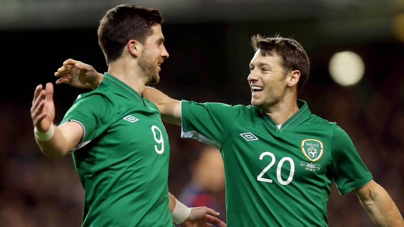 Shane Long and Wes Hoolahan celebrate Ireland's goal