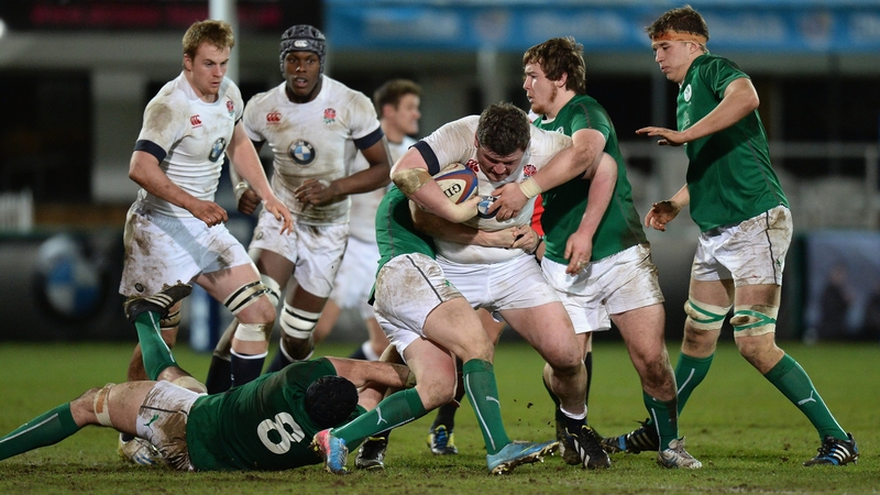 Max Abbott (tackler, right) in action for Ireland's under-20s against England in February