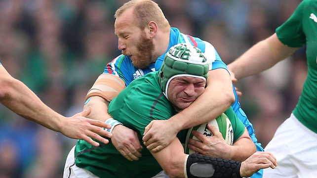 Rory Best is tackled by Italy’s Leonardo Ghiraldini