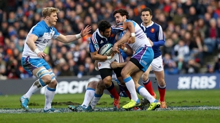 Scotland's David Denton, Johnnie Beattie and Alex Dunbar tackle France's Maxime Mermoz