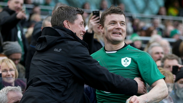 Brian O'Driscoll is congratulated by his long-time Ireland teammate Ronan O'Gara