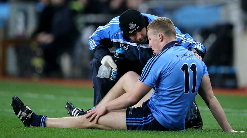 Ciarán Kilkenny on the Croke Park turf after picking up his injury