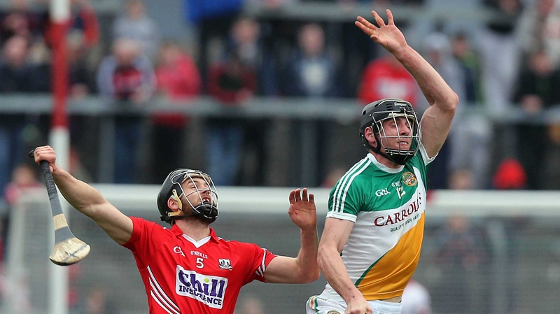 Eoin Cadogan of Cork with Conor Mahon of Offaly