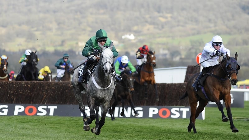 Jockey Richie McLernon on Holywell (r) clear the last to go on and win by nearly two lengths