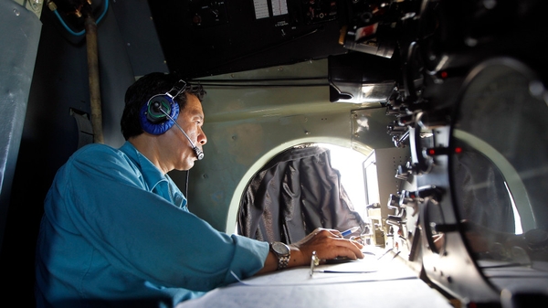 Vietnamese military official takes notes during search and rescue operations for MH379 (Pic: EPA)