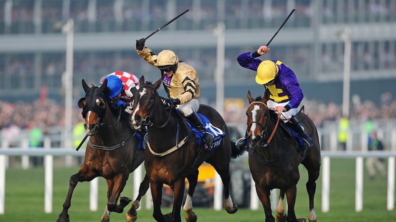 Davy Russell claimed the Gold Cup aboard Lord Windermere (right)