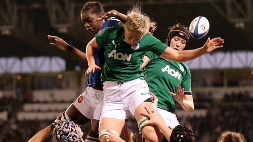 Claire Molloy and Marie Louise Reilly of Ireland compete with Coumba Diallo