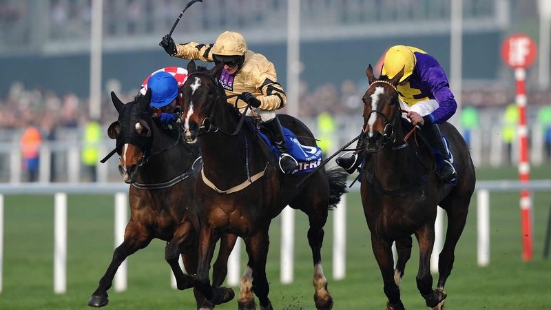 Davy Russell on Lord Windermere (r) and on On His Own (centre) and Tom Scudamore on The Giant Bolster battled out a thrilling finish to the jumping highlight