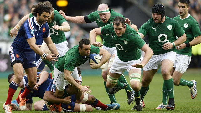 Dave Kearney makes some hard yards with plenty of team-mates in support