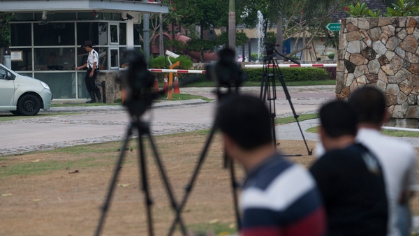 Photographers gathered outside the residence of Captain Zaharie Ahmad Shah (Pic: EPA)