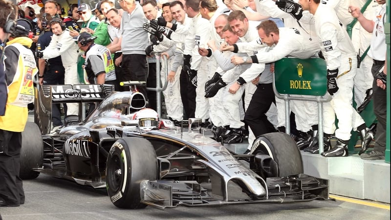 Nico Rosberg is congratulated by his crew