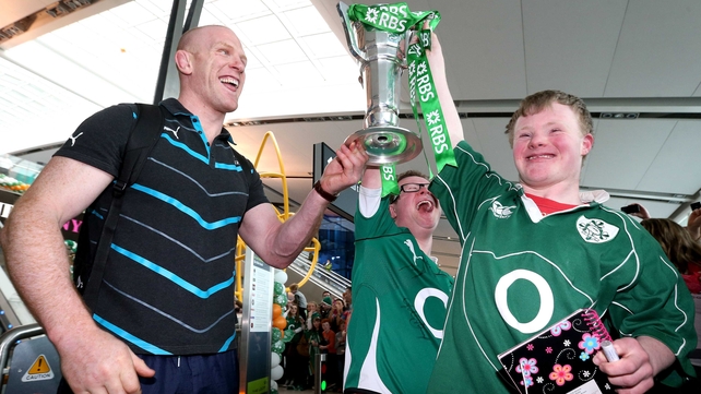 Fans lift the trophy with Paul O'Connell