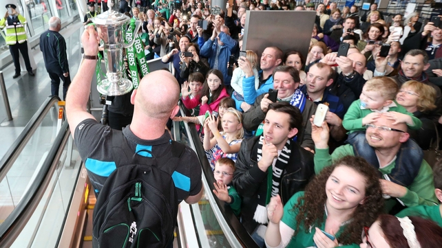 O'Connell displays the trophy to the delighted crowd at Dublin Airport