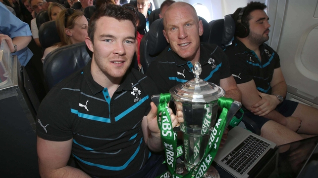 Peter O'Mahony and Paul O'Connell with the Six Nations trophy on the flight home