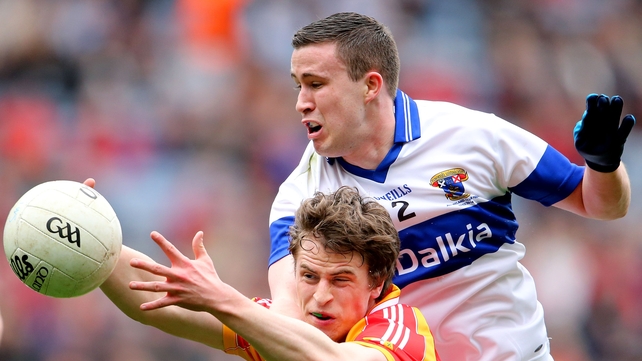 Neil Douglas and Kevin Bonnie vying for the ball