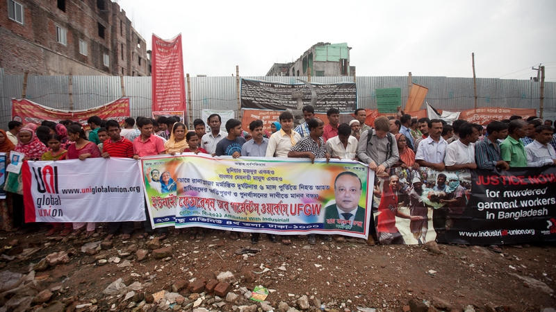 Activists demonstrated on the site where the building collapsed six months after the disaster